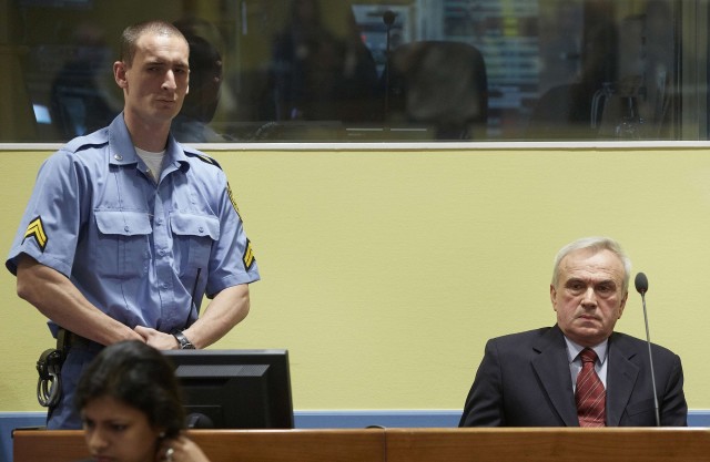 Stanisic, former chief of Serbian State Security, sit in the courtroom prior to the Trial Chamber Judgement at the International Criminal Tribunal for the former Yugoslavia in the Hague